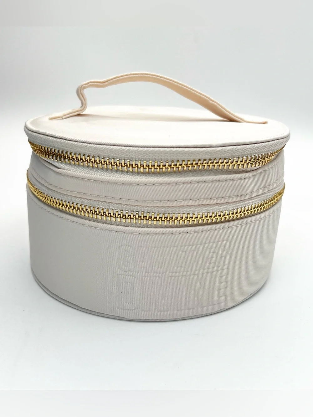 Gaultier Divine Vanity - Round Cosmetic Bag with Gold Accents in Cream